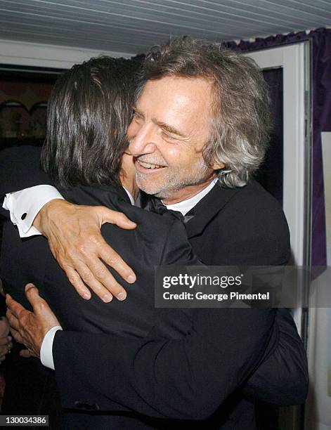 Gael Garcia Bernal and Curtis Hanson during 2004 Cannes Film Festival -"Motorcycle Diaries" - Party at La Plage Coste in Cannes, France.