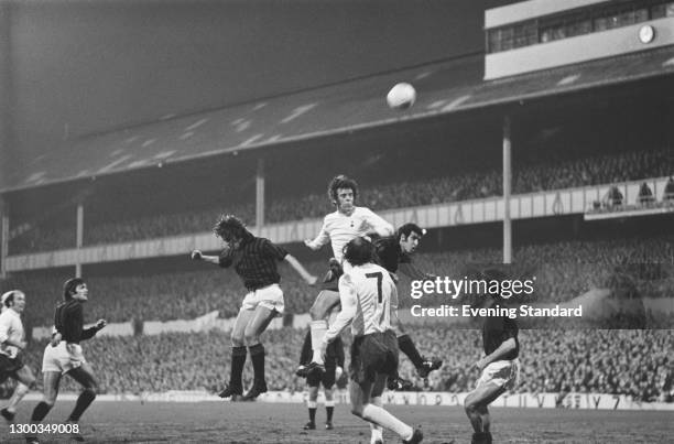 Welsh footballer Mike England of Tottenham Hotspur takes on AC Milan in the first leg of the UEFA Cup Semi Final at White Hart Lane, London, UK, 5th...