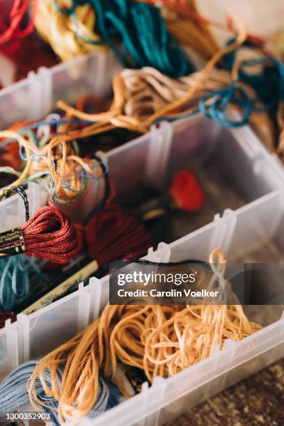 many different threads of color in a container - embroidery frame stock pictures, royalty-free photos & images