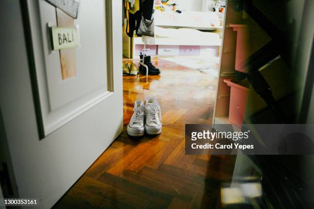 family sport shoes at home - guest room stock pictures, royalty-free photos & images