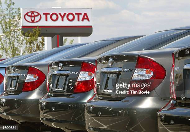 Several 2002 Toyota Camrys are visible at Bredemann Toyota August 8, 2002 in Park Ridge, Illinois. Japan's biggest automaker, Toyota Motor Corp....