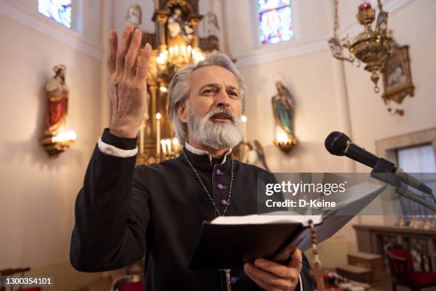 priest - preacher stock pictures, royalty-free photos & images