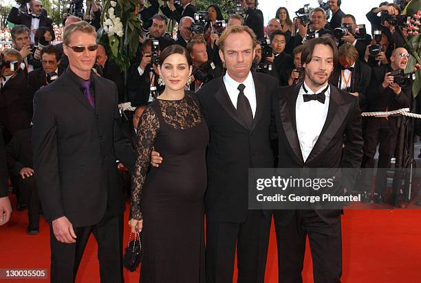 Adrian Rayment, Carrie-Anne Moss, Hugo Weaving, and Keanu Reeves