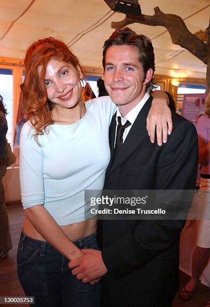 Jenna Mattison and Sean Maguire during 2004 Cannes Film Festival - "Fish Without A Bicycle" - Party at Rondo La Plage in Cannes, France.