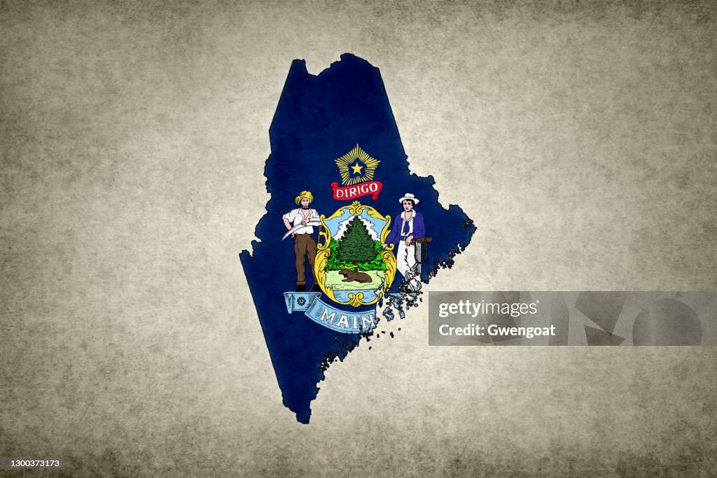 Grunge map of the state of Maine with its flag printed within
