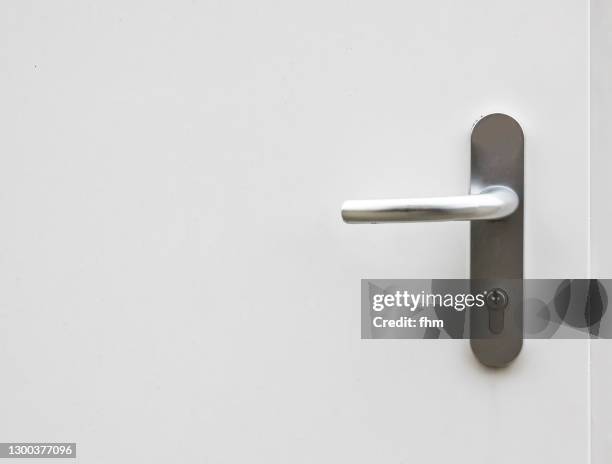 white door and doorknob - white doorway stock pictures, royalty-free photos & images