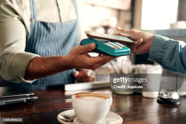 easy payments made without a wallet or credit card - tapping stock pictures, royalty-free photos & images