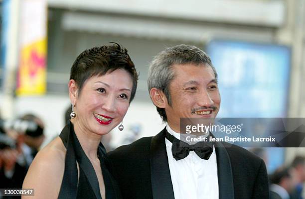 Tsui Hark and wife during Cannes Film Festival 2004 - "2046" Premiere at Palais des Festivals in Cannes, France.