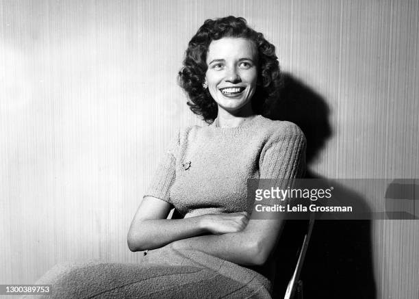 Country singer songwriter June Carter Cash sits backstage at the Grand Ole Opry circa 1951 in Nashville, Tennessee.