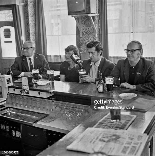Customers in the Eagle pub on Farringdon Road in London, UK, 11th July 1972.