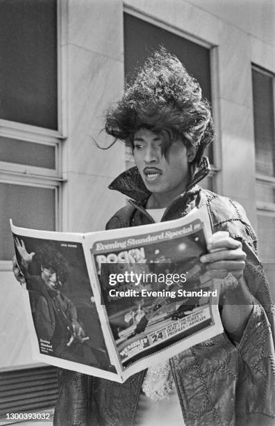 American singer and musician Little Richard reading an Evening Standard Special featuring the official programme of the Rock 'N' Roll Revival in...