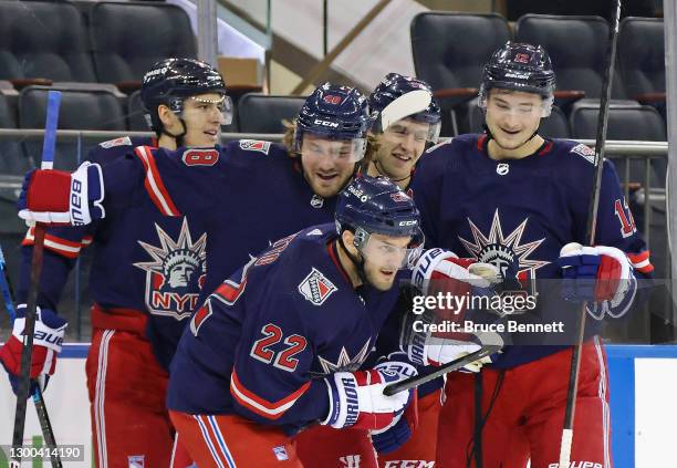 The New York Rangers celebrate a second period goal by Anthony Bitetto against the Washington Capitals at Madison Square Garden on February 04, 2021...