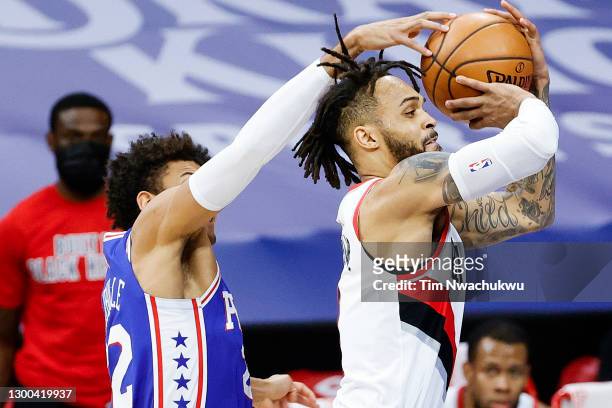 Gary Trent Jr. #2 of the Portland Trail Blazers is blocked by Matisse Thybulle of the Philadelphia 76ers during the first quarter at Wells Fargo...