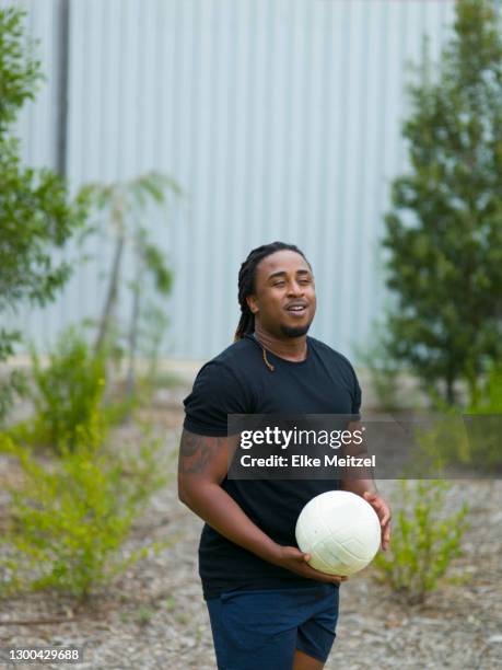 man with soccer ball - fat soccer players stock pictures, royalty-free photos & images