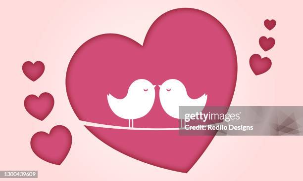 beautiful couple birds on pink hearts background - falling in love stock illustrations