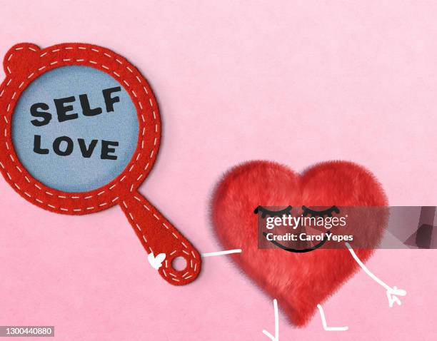conceptual image of self love-cartoon heart with mirror - self love stock pictures, royalty-free photos & images