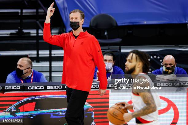 Head coach Terry Stotts of the Portland Trail Blazers signals to players during the fourth quarter against the Philadelphia 76ers at Wells Fargo...