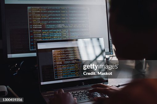 Engineerin Gcoding Young Female Engineer Coding Over Laptop In It Startup Company High-Res ...