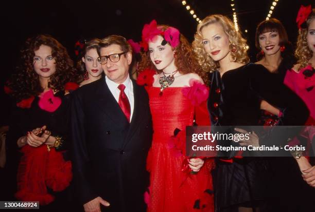 Fashion designer Yves Saint Laurent , Karen Mulder and models pose after the Saint Laurent Ready to Wear AW 1994-95 show as part of Paris Fashion...