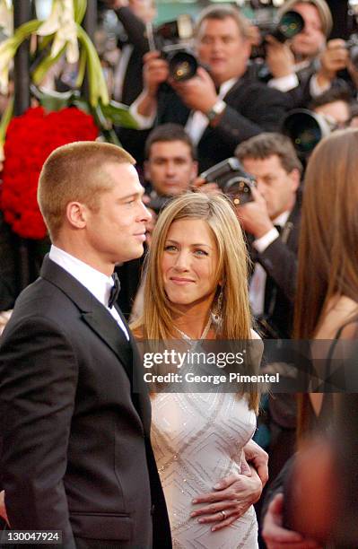 Brad Pitt and Jennifer Aniston during 2004 Cannes Film Festival - "Troy" Premiere at Palais Du Festival in Cannes, France.