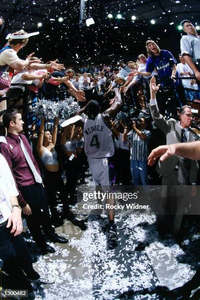 Chris Webber of the Sacramento Kings celebrates with the fans after winning game 4 against the Los Angeles Lakers in the first round of the 2000 NBA...