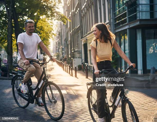 machen sie das beste aus jedem moment, den das leben ihnen gibt - amsterdam bike stock-fotos und bilder