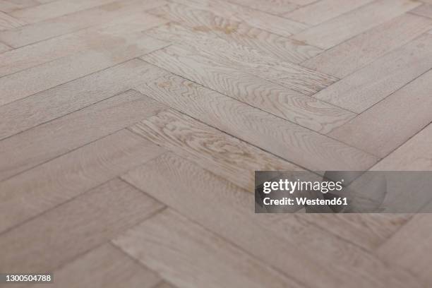 full frame shot of herringbone parquet floor at home - herringbone stock pictures, royalty-free photos & images