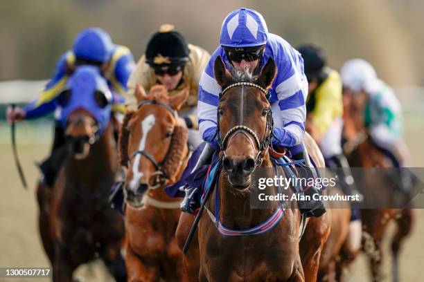 Martin Dwyer riding Lucky Ava win The Play Ladbrokes 5-A-Side On Football Handicap at Lingfield Park Racecourse on February 05, 2021 in Lingfield,...