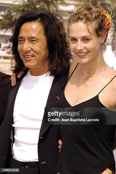 Jackie Chan and Cecile de France during 2003 Cannes Film Festival - "Around the World in 80 Days" Photo Call at Majestic Pier in Cannes, France.
