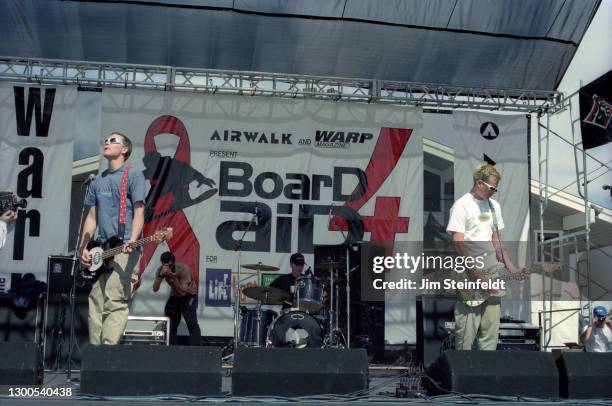 Rock band Blink 182 Mark Hoppus, Travis Barker, Tom DeLonge performs at the Board Aid Benefit in Big Bear, California on March 15, 1997.