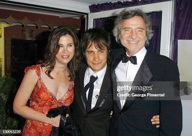 Walter Salles, Rebecca Yeldman and Curtis Hanson during 2004 Cannes Film Festival -"Motorcycle Diaries" - Party at La Plage Coste in Cannes, France.