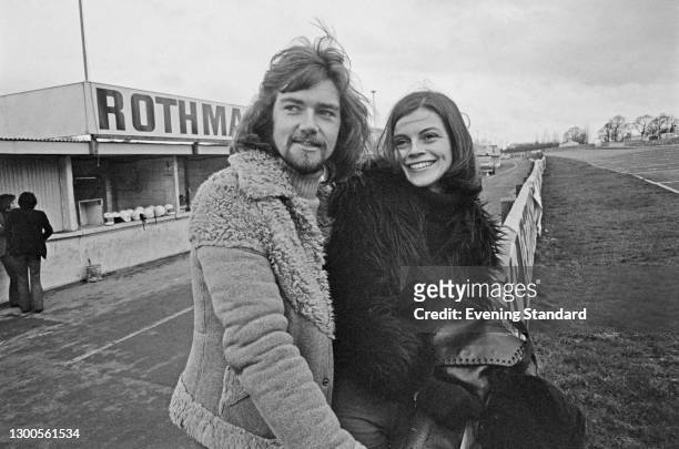 English disc jockey and television presenter Noel Edmonds with his wife Gillian at a race track, UK, March 1973.