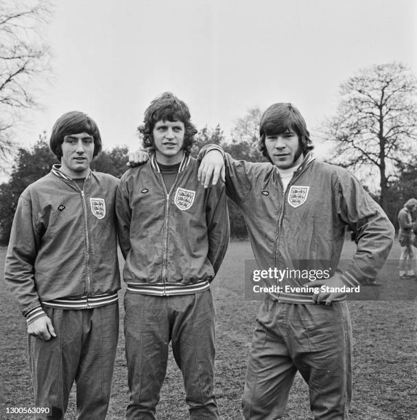 From left to right, footballers John Richards, Mick Channon and Malcolm Macdonald at a training session with the rest of the England team prior to...