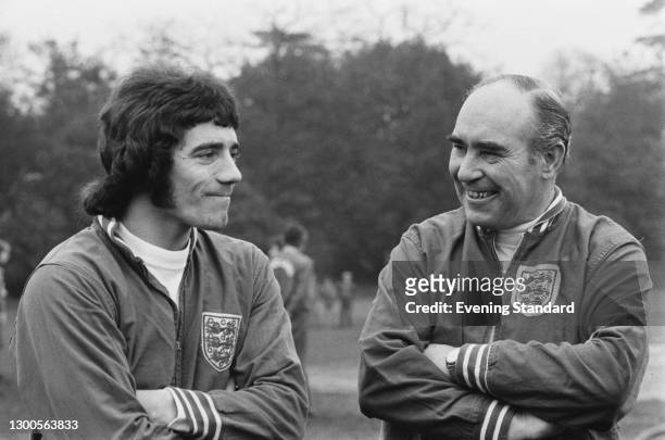 English footballer Kevin Keegan with England team manager Alf Ramsey during a training session for the FIFA World Cup qualifying match against Wales...