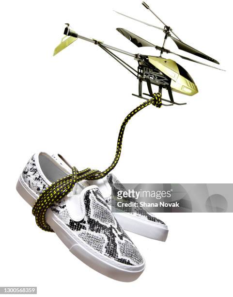 drone delivers shoes - "shana novak" stock pictures, royalty-free photos & images