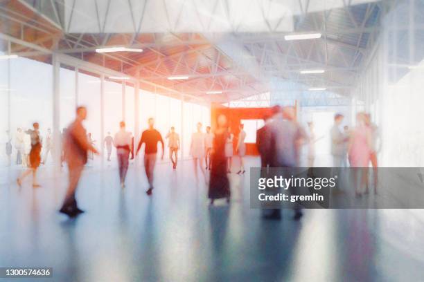 defocused unrecognizable group of business people - sparse crowd stock pictures, royalty-free photos & images