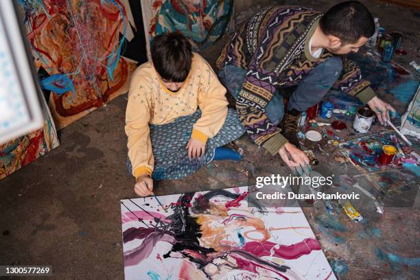 father and son artists spending day together - espetáculo de arte imagens e fotografias de stock