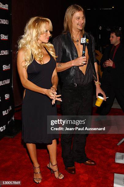 Pamela Anderson and Kid Rock during STUFF Magazine and Blender Host Kid Rock's After - Party For The 2003 American Music Awards- Red Carpet/Inside at...