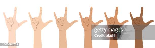 multi-ethnic hands show love in american sign language - sign language stock illustrations