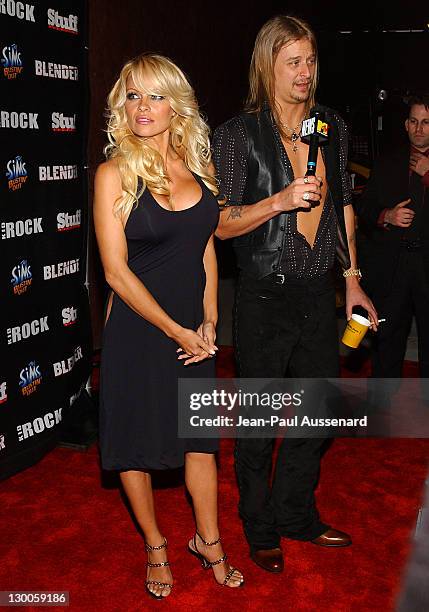 Pamela Anderson and Kid Rock during STUFF Magazine and Blender Host Kid Rock's After - Party For The 2003 American Music Awards- Red Carpet/Inside at...