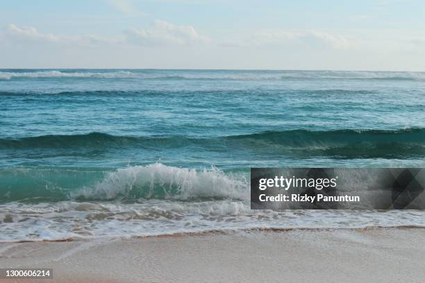 melasti beach, uluwatu, bali, indonesia - melasti ceremony in indonesia stock pictures, royalty-free photos & images