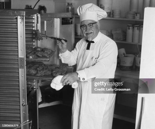 Founder of restaurant chain Kentucky Fried Chicken, Colonel Harland David Sanders cooking his fried chicken 1969 in Nashville, Tennessee.
