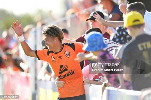 Riku Danzaki of the Roar celebrates scoring a goal during the A-League match between the Brisbane Roar and the Melbourne Victory at Dolphin Stadium,...