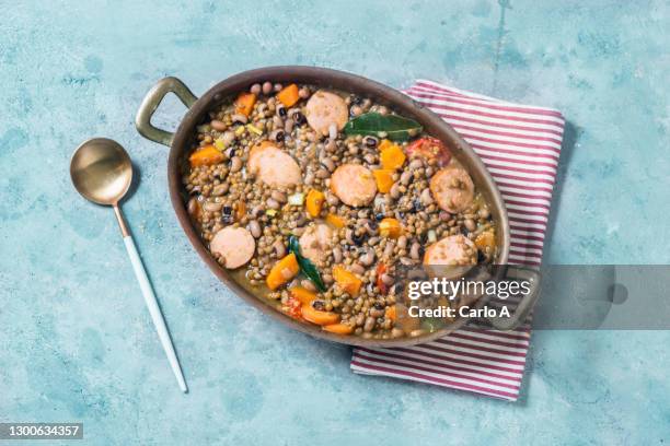 lentil and beans stew with sausage - stew stock pictures, royalty-free photos & images