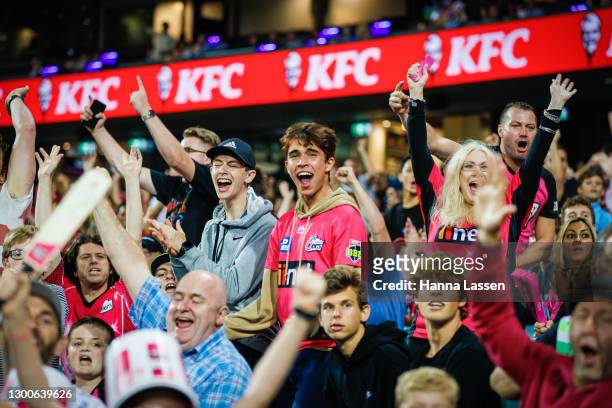 Fans react during the Big Bash League Final match between the Sydney Sixers and the Perth Scorchers at the Sydney Cricket Ground on February 06, 2021...