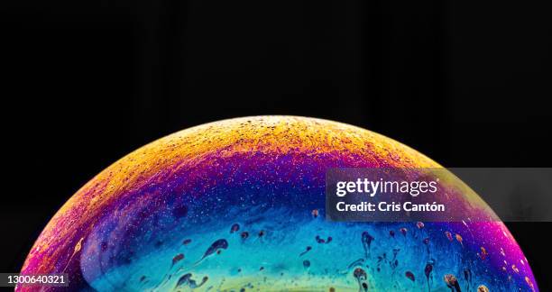 half soap bubble on black background - liquid galaxy stock pictures, royalty-free photos & images