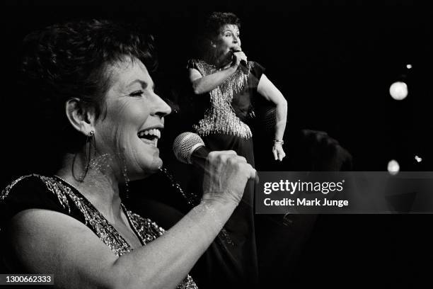 Australian-American singer Helen Reddy performs at the Cheyenne Civic Center on November 7, 1990 in Cheyenne, Wyoming. Dubbed by the Chicago Tribune...