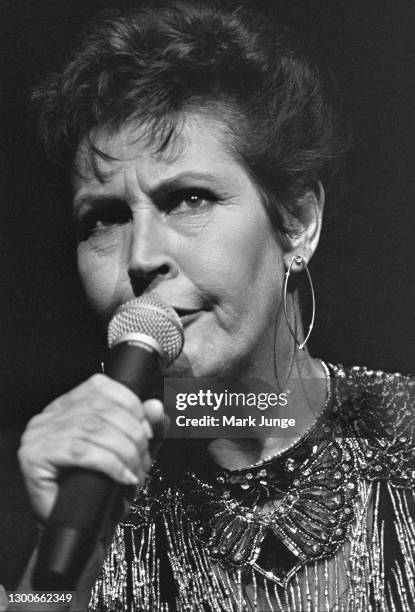 Australian-American singer Helen Reddy performs at the Cheyenne Civic Center on November 7, 1990 in Cheyenne, Wyoming. Dubbed by the Chicago Tribune...