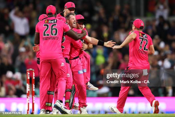 The Sixers celebrate victory in the Big Bash League Final match between the Sydney Sixers and the Perth Scorchers at the Sydney Cricket Ground on...