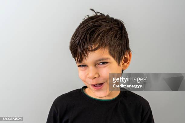 8 years old little boy with a happy cute smiling face - 8 9 years stock pictures, royalty-free photos & images